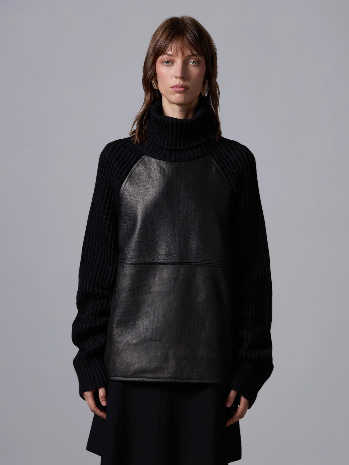 Collo alto con pelle